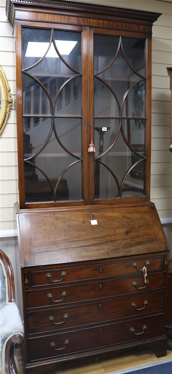 A George III mahogany bureau bookcase, H.240cm
